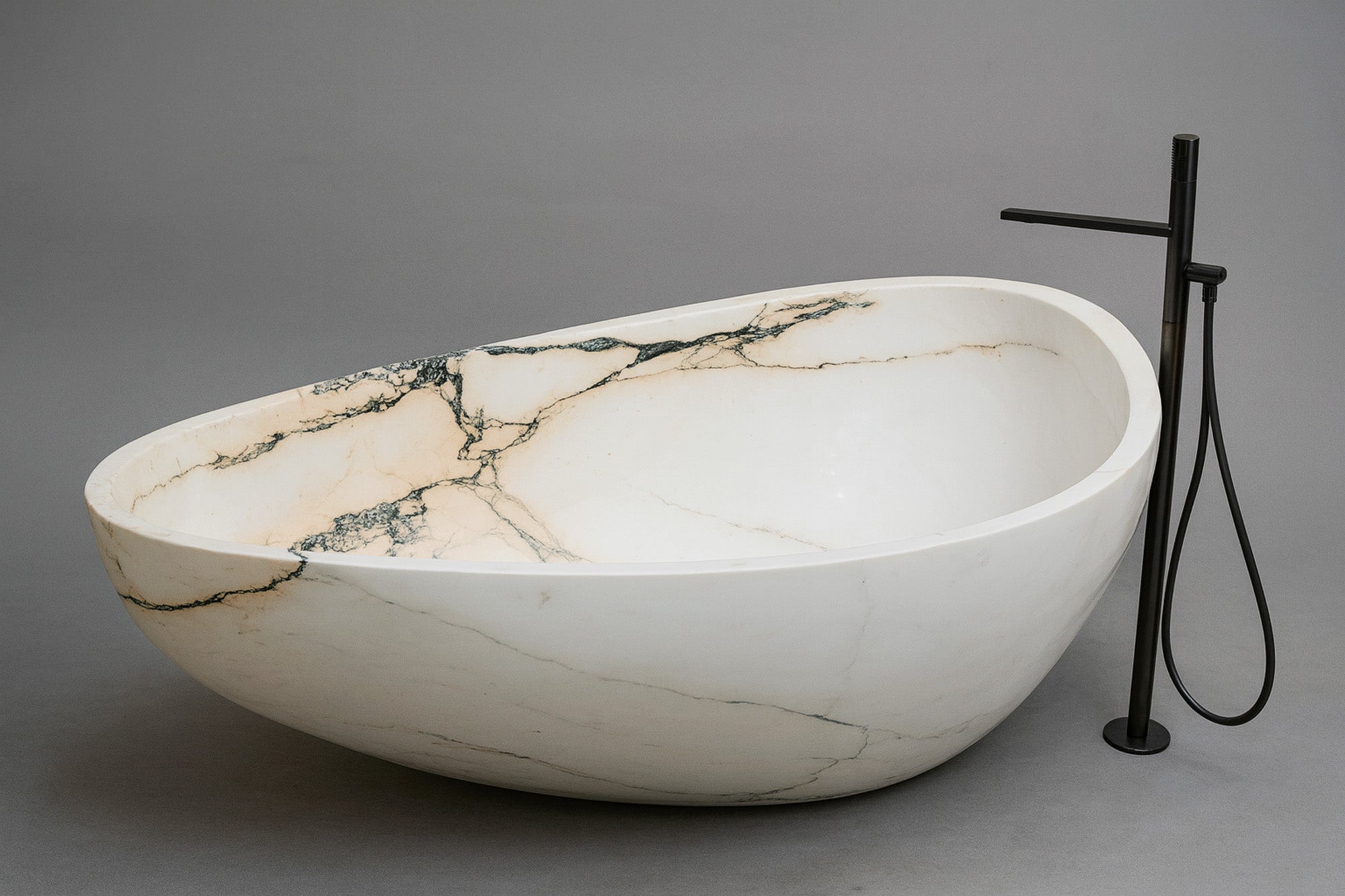Carved natural stone bathtub